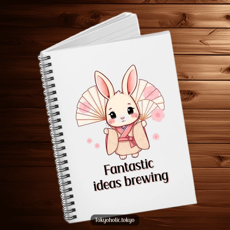 Funny notebook with a sweet bunny in a kimono, peeking from behind fans, offering a charming and humorous cover for notes.